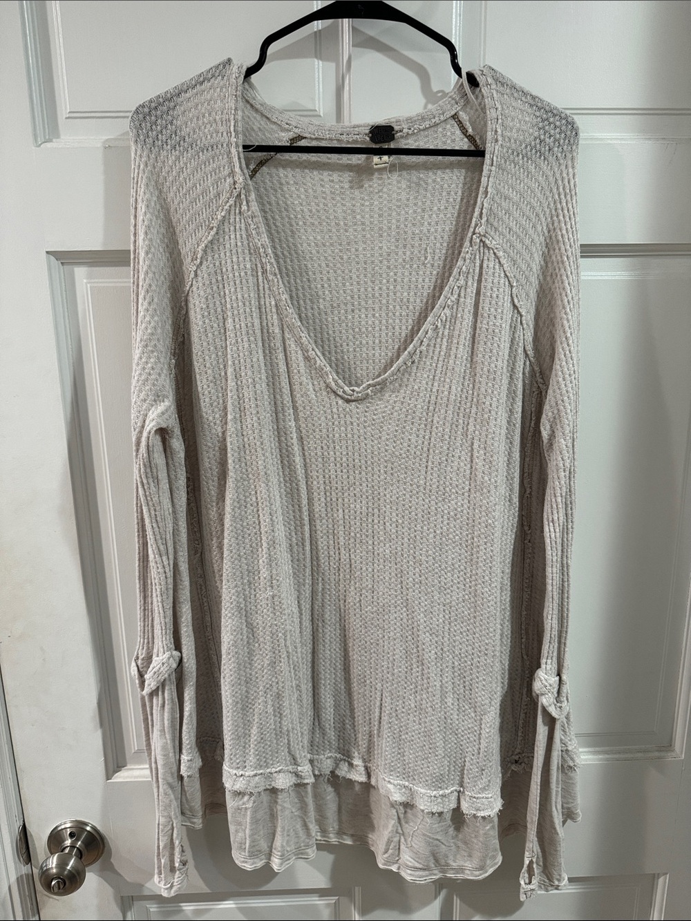 Free People light taupe waffle knit V-neck tunic with ruffle hem
